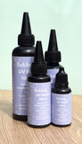 Four bottles of Bekbek Makes UV Resin on a wooden surface with a light green background